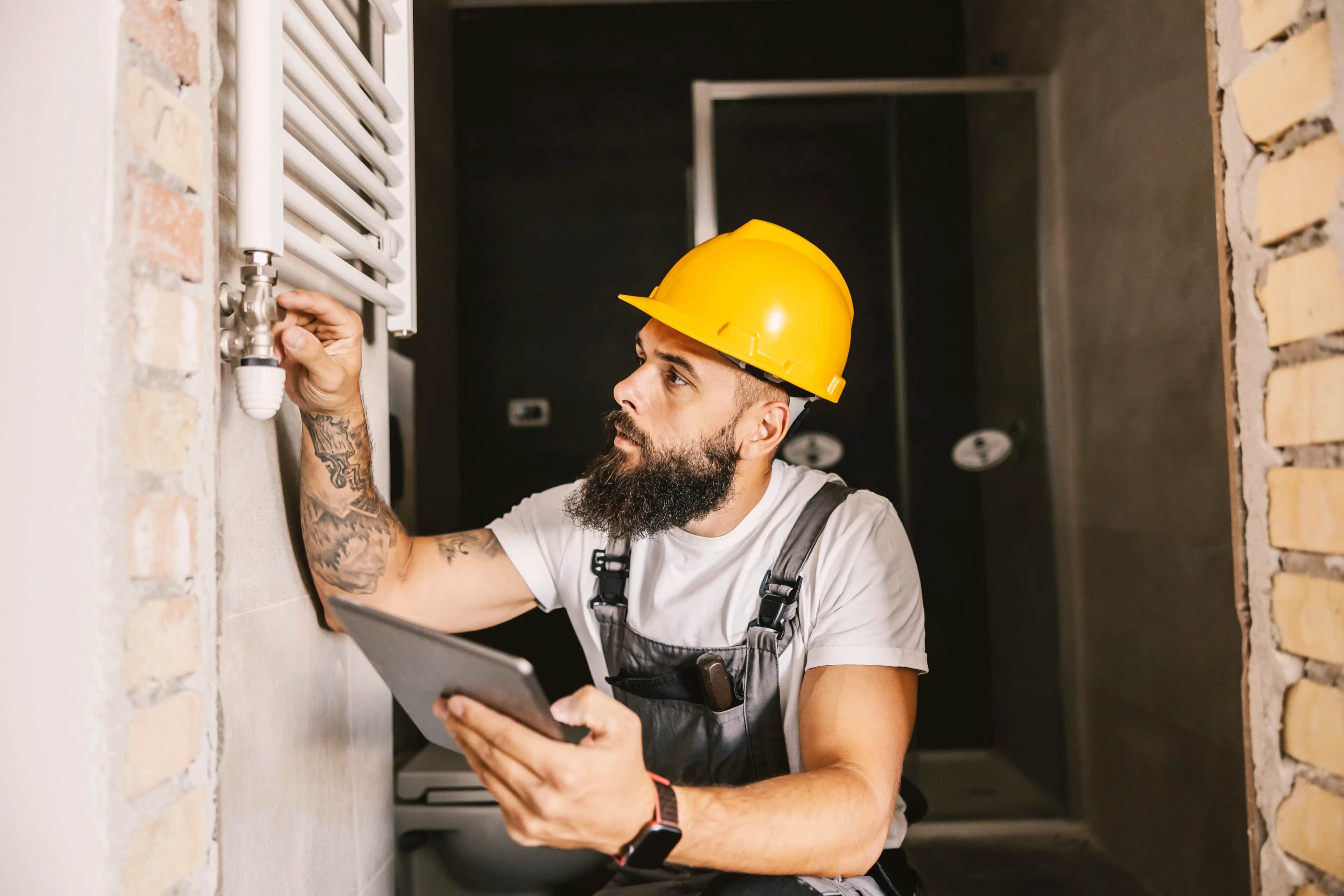 Tradie completing work after winning the job through their high-performing website